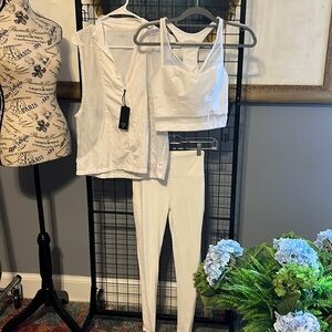 Lanston size small three piece set. Tops nwt